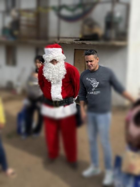 Pastor Miguel prays during SIMS trip to Ensenada