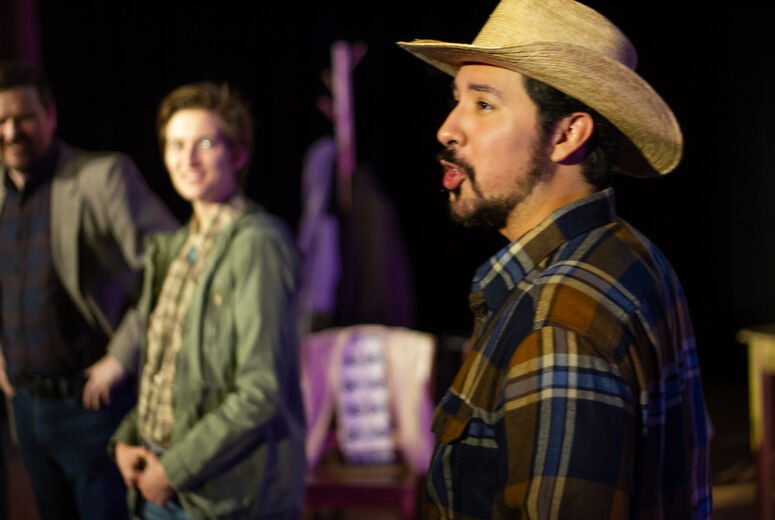 Actors perform in The Laramie Project