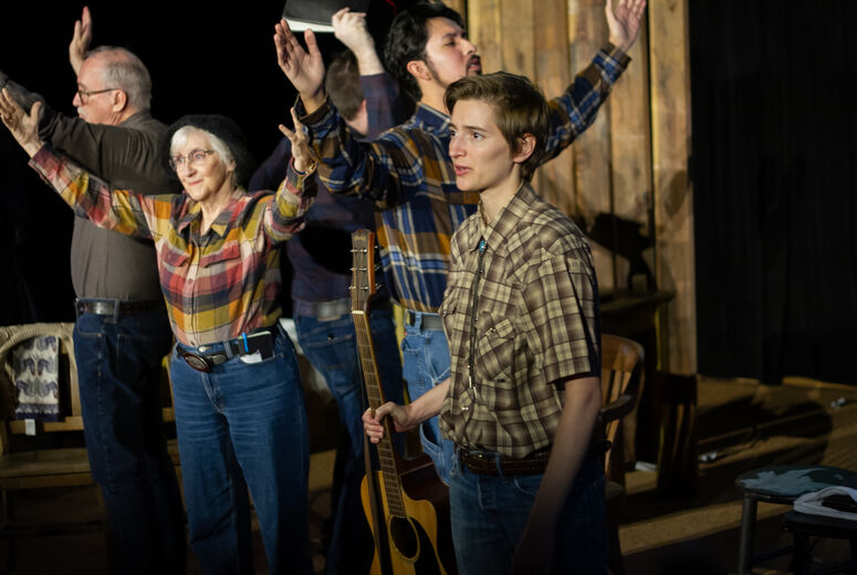 Actors perform in The Laramie Project
