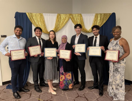 SR students pose with their scholarship certificates